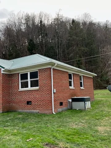 Seamless Gutters on Brick Home - Gutters project by Big Willie's